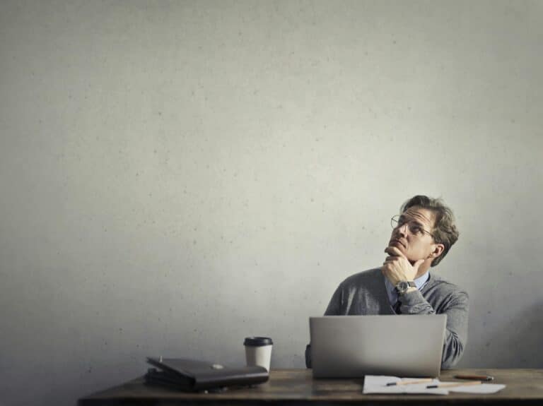 Man thinking which AI Ads to use